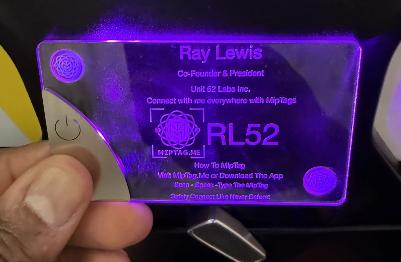 An illuminated Ray Lewis contact card bearing RL52